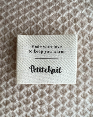 "MADE WITH LOVE TO KEEP YOU WARM"-LABEL